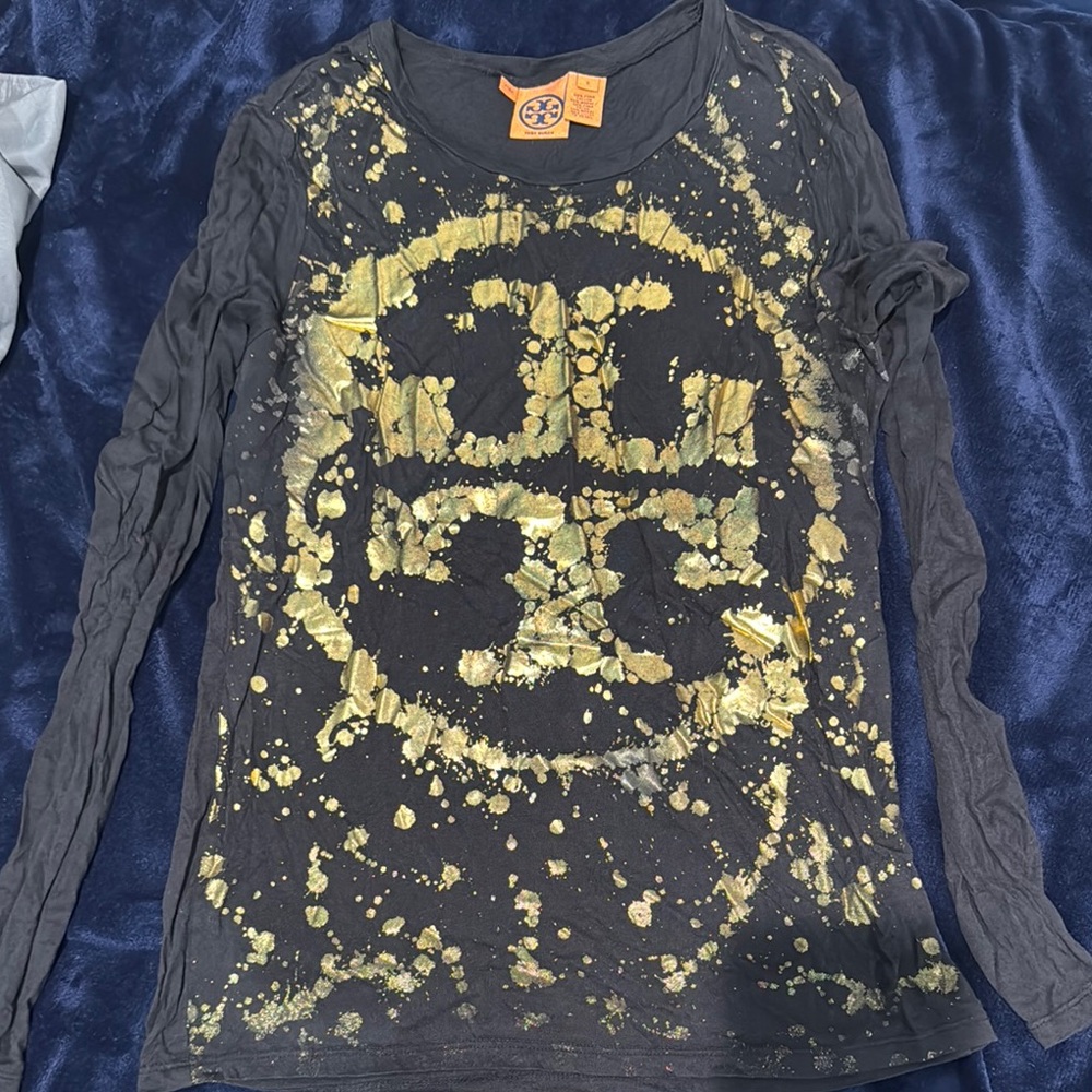 Tory Burch Black and Gold Long Sleeve Top with Eye-Catching Design